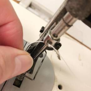 8. hole above needle